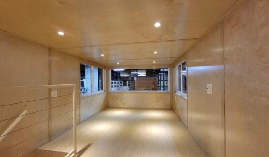 escape-eone-tall-tiny-house-with-main-floor-bedroom-006-900x527-1 Escape eOne Tall Tiny House with a Main-Floor Bedroom Option