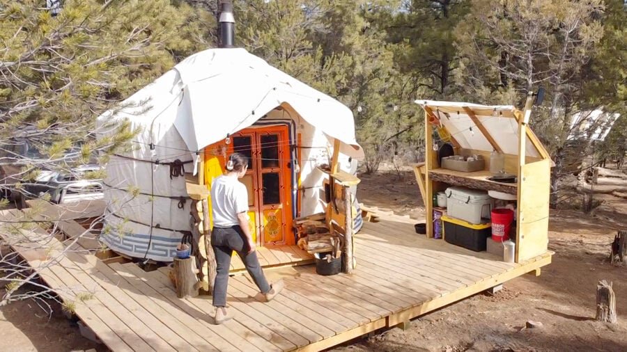 Woman Living Off Grid in a Tiny Yurt Exterior- Exploring Alternatives and Molly Caroline