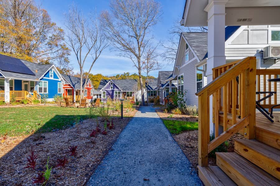 Edible landscaping with fruit trees and garden beds throughout the Cottages on Vaughn community.