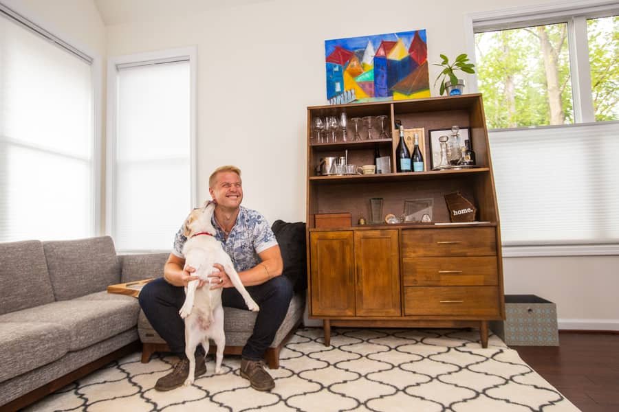 Cozy tiny house living area with open-concept layout at Cottages on Vaughn in Georgia.